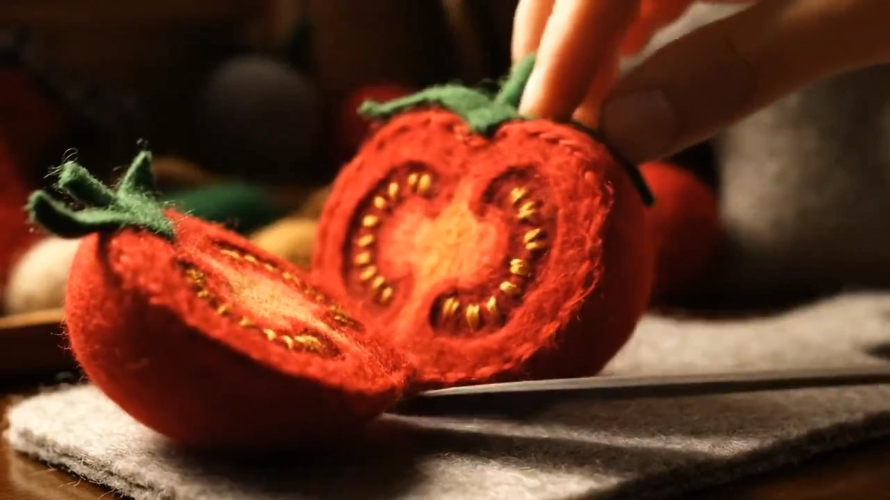 Slicing a felt tomato